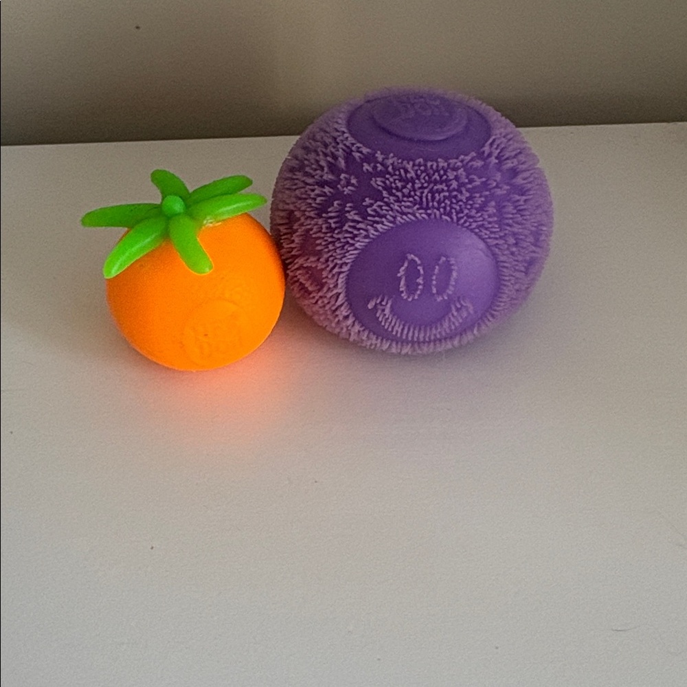 Schylling Needoh Purple Smiley Fuzzy Ball & small orange NeedOh.